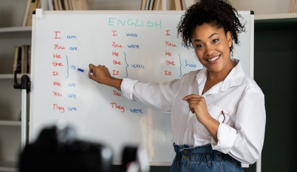 medium-shot-smiley-woman-teaching